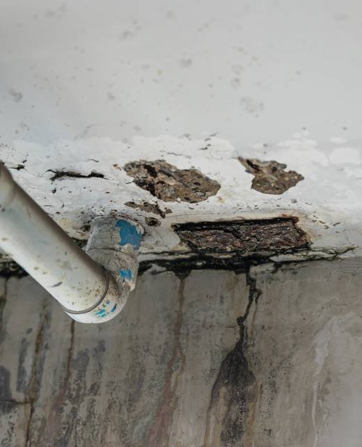 sewer pipe leak bad old plumbing water leakage inside the concrete wall rusty damaged building